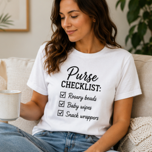 T-Shirt — "The Catholic Purse Checklist: Rosary Beads, Baby Wipes, Snack Wrappers"