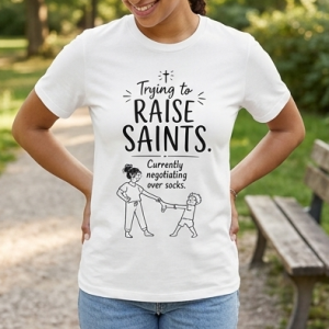 Trying to Raise Saints Tee — "Currently Negotiating Over Socks" Catholic Parenting Shirt